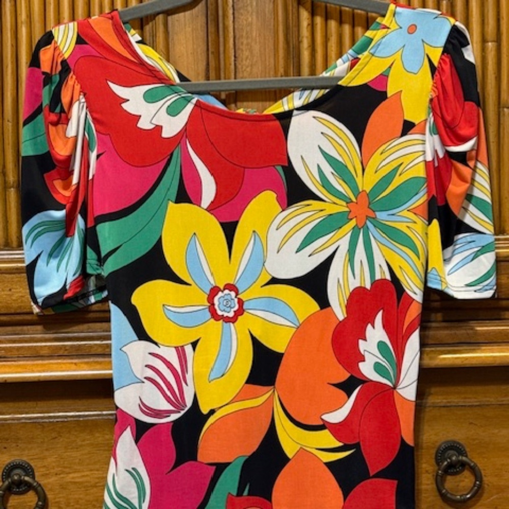 Colorful top with scoop back.